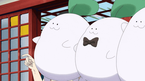 a cartoon character wearing a bow tie stands next to two other characters