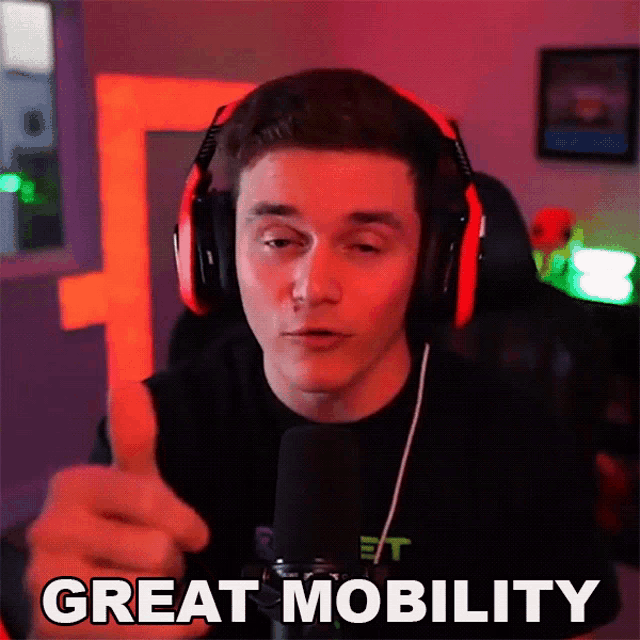 a man wearing headphones giving a thumbs up with the words great mobility written below him