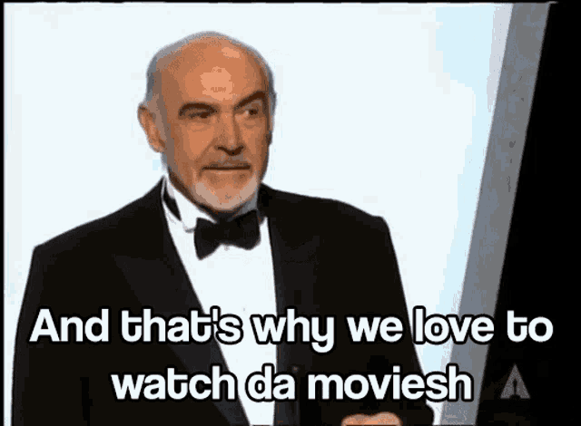 a man in a tuxedo says " and that 's why we love to watch da moviesh "