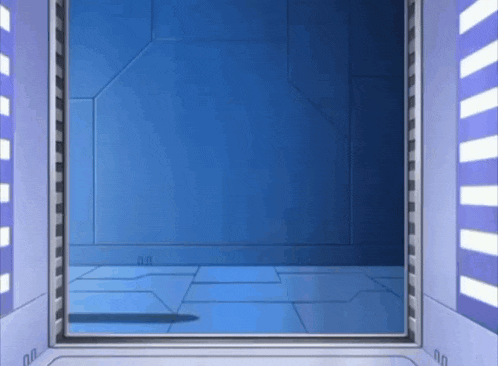 an empty room with a blue wall and a white door