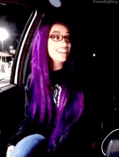 a woman with purple hair and glasses says sasha he doesn t like me
