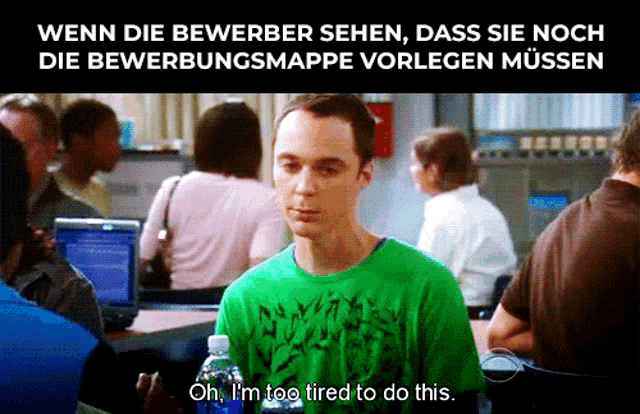a man in a green shirt says " oh i 'm too tired to do this " in front of a crowd