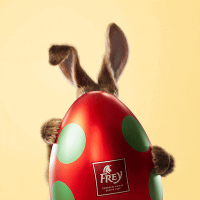 a red egg with green polka dots and a frey logo