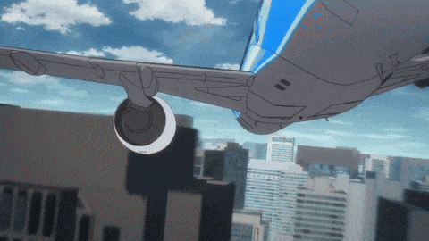 an airplane is flying over a city with a blue and white stripe on the tail