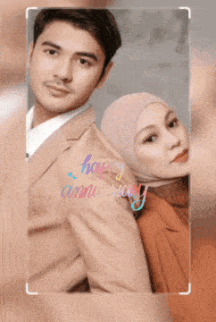 a man in a suit and a woman in a hijab are posing for a picture with the words happy anniversary on the bottom right