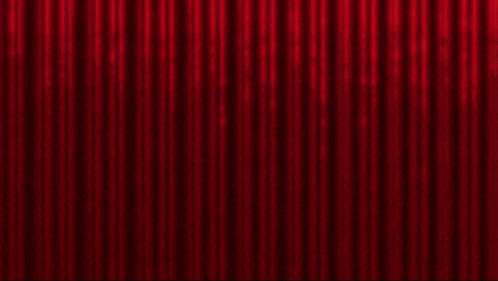 a man in a hat is behind a red curtain with the words merry christmas and happy holidays on the bottom