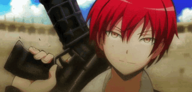 a close up of a person holding a gun in their hand .