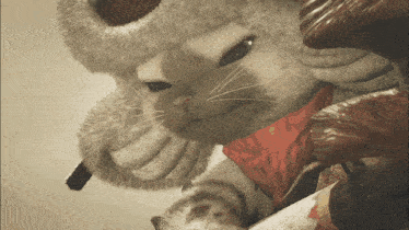 a cat wearing a furry hat and a red bandana