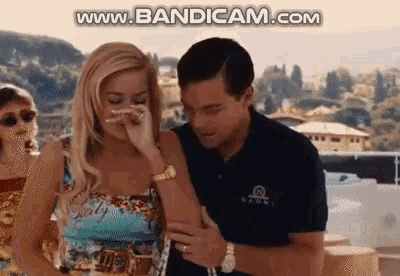 a man and a woman are standing next to each other with the words www.bandicam.com on the bottom right