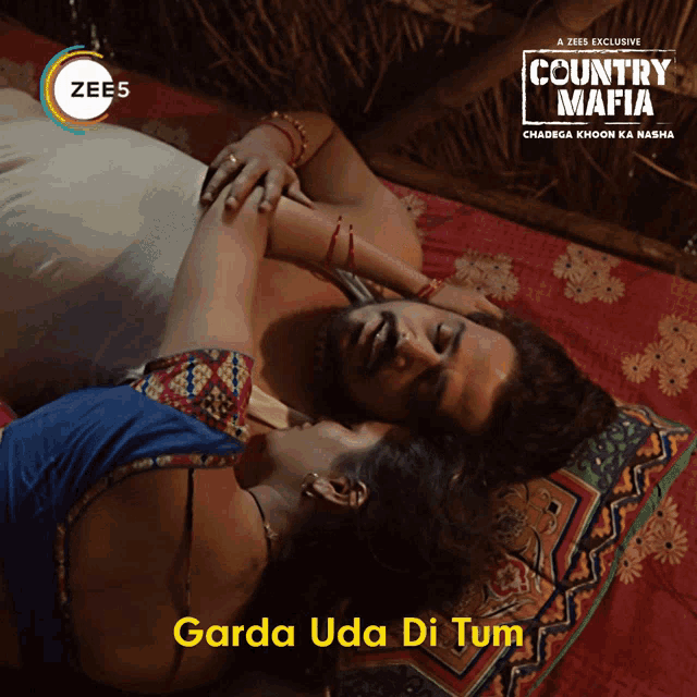 a poster for country mafia features a man and a woman laying on a bed