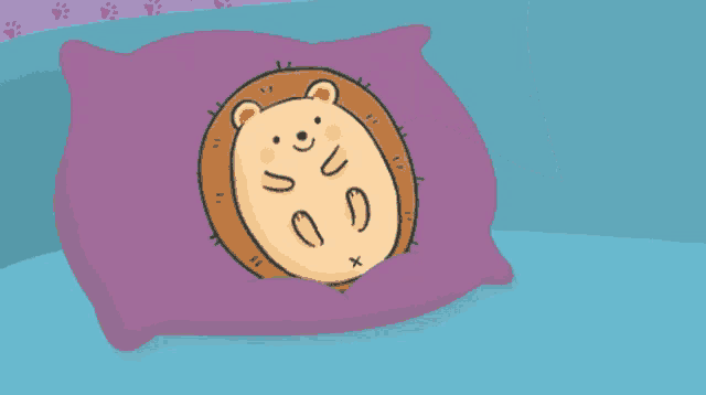 a hedgehog is laying on a purple pillow