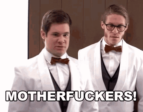 two men standing next to each other with the words motherfuckers