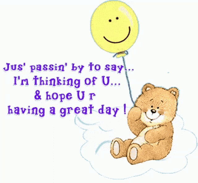 a teddy bear is holding a yellow balloon with a face on it