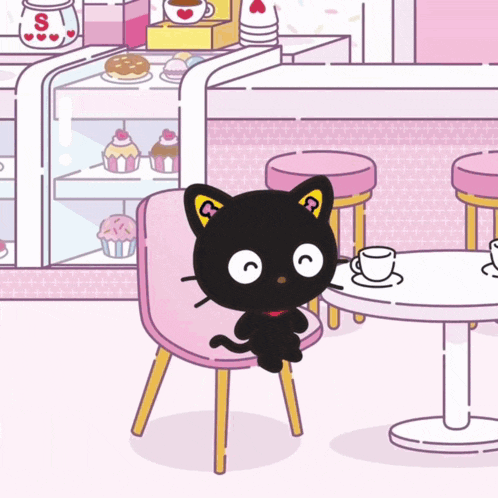 a black cat sits on a chair in a diner