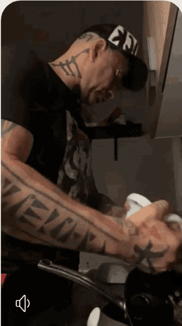 a man with a tattoo on his arm that says crew on it