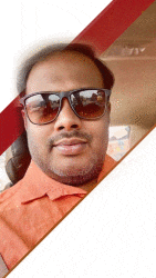 a man wearing sunglasses and an orange shirt