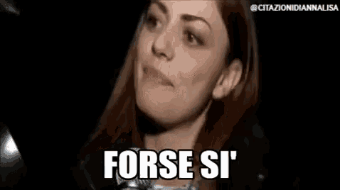 a woman with red hair is making a funny face and saying `` forse si '' .