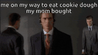 a man in a suit and tie is talking on a phone with the words me on my way to eat cookie dough my mom bought