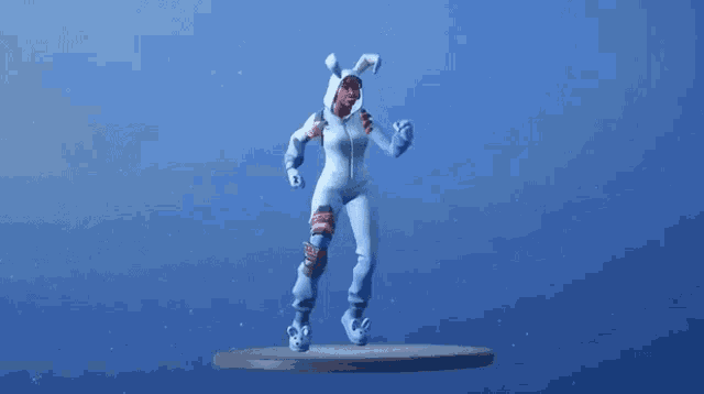 a woman in a blue bunny suit is dancing on a podium in a video game .