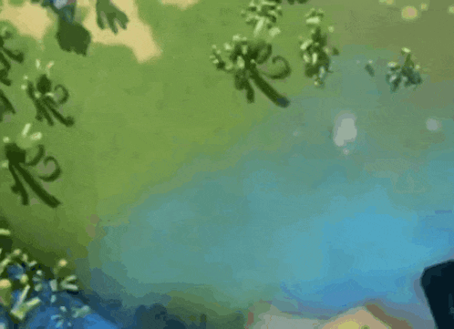 a blue seahorse is swimming in the water .