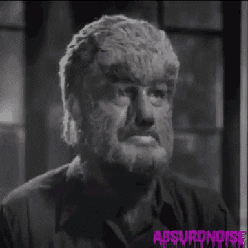 a black and white photo of a man with a furry face and a beard with the words absurdnoise on the bottom right