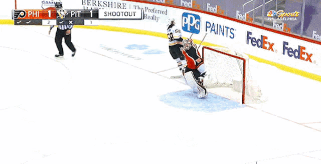 a hockey game is being played and the score is 1 to 1