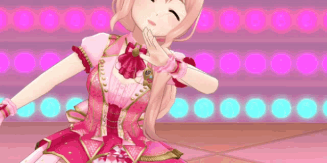 a girl in a pink dress is dancing on a stage with a pink background .
