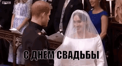 a bride and groom are standing next to each other at their wedding ceremony in a church .