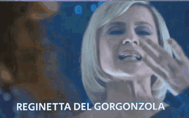 a picture of a woman with the words reginetta del gorgonzola above her