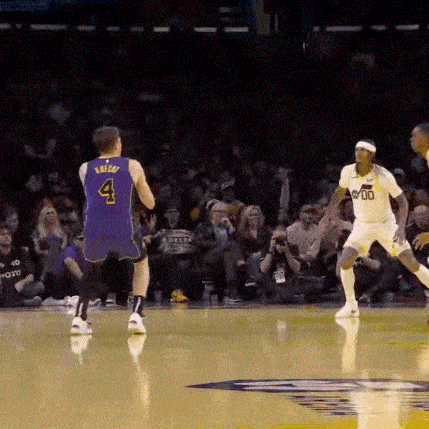 a man in a purple jersey with the number 4 on the back