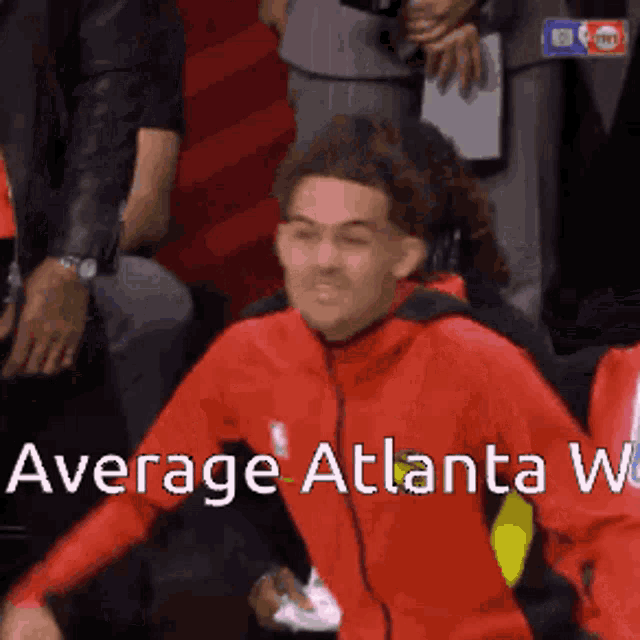 a man in a red jacket with the words average atlanta w. on the bottom