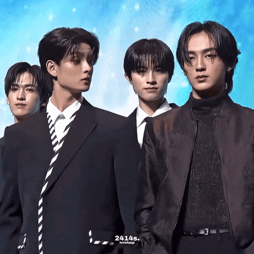 a group of young men are standing next to each other and the number 24145 is on the bottom right