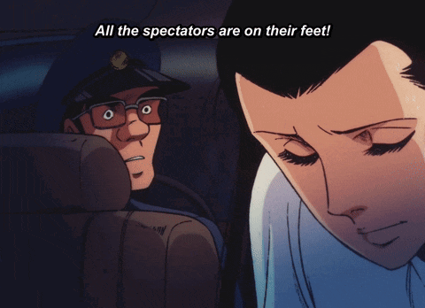 a man in a car with the words " all the spectators are on their feet " on the bottom