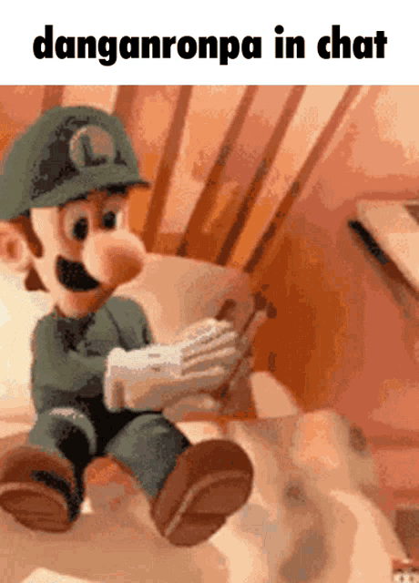 a cartoon character with the words danganronpa in chat