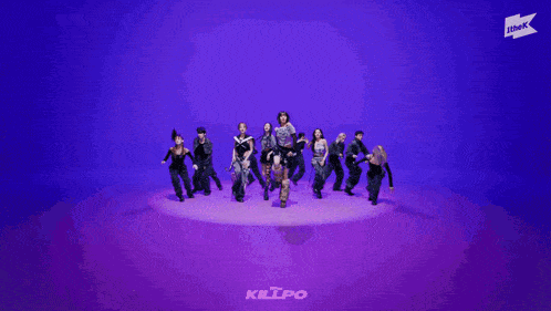 a group of women are dancing in front of a purple background that says killpo on it