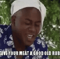 a man wearing a white hat and a blue shirt is saying `` give your meat a good old rub `` .