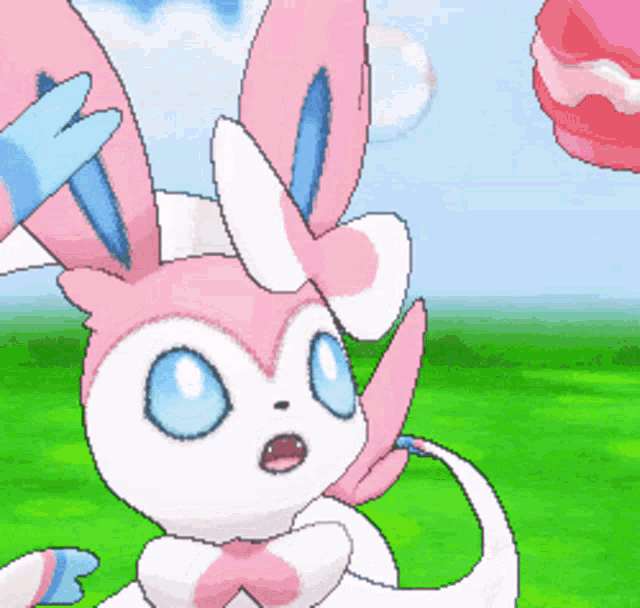 a pixel art of a pink and white bunny rabbit