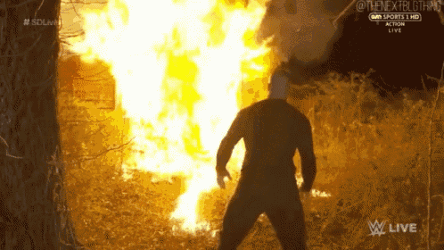 a man is standing in front of a fire with the words " the next big thing " on the bottom right
