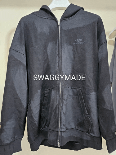 a black sweatshirt with the word swaggymade on the bottom