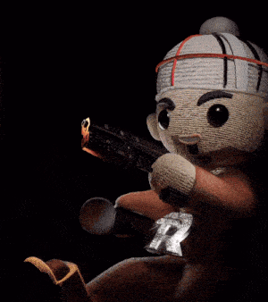 a teddy bear is holding a lighter and a flame