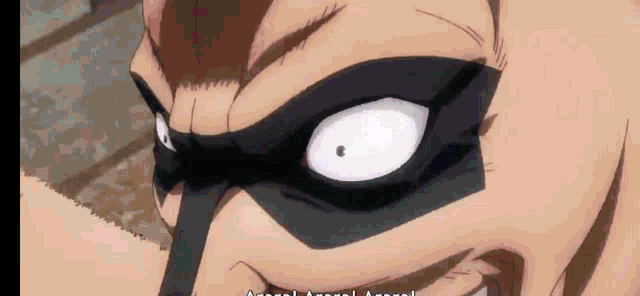a close up of a man 's face with a mask on his face .