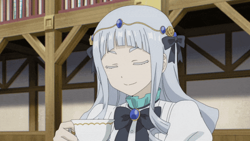 a girl with white hair is holding a cup of tea with her eyes closed