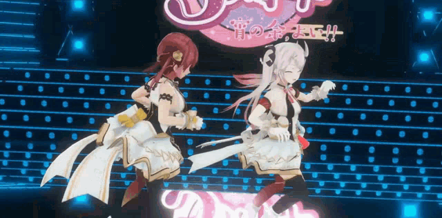 two anime girls are dancing on a stage in front of a sign that says ' i love you ' on it