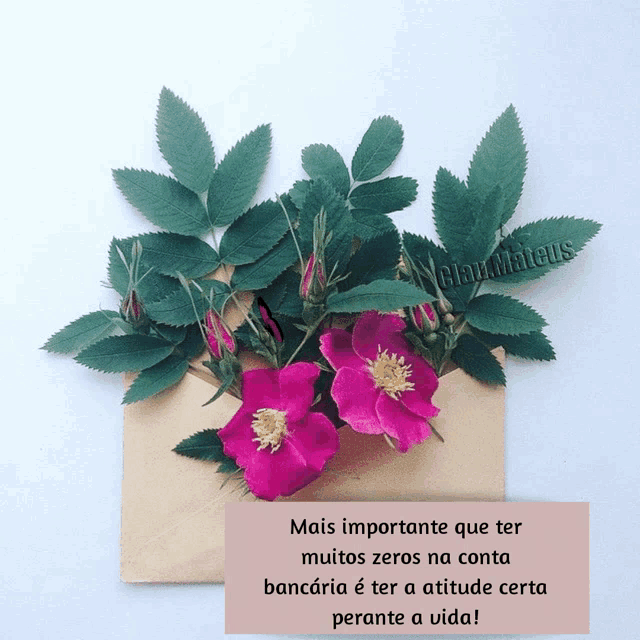 an envelope with pink flowers and green leaves and a quote in portuguese