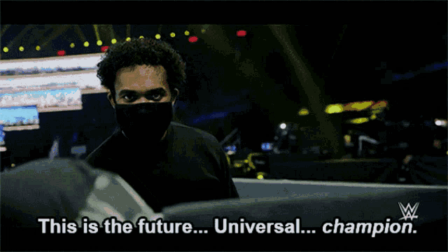 a man wearing a mask says " this is the future ... universal ... champion "
