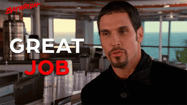 a man with a beard is in front of a sign that says " great job "