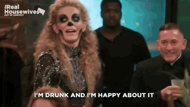a woman in a skeleton costume says that she is drunk and happy about it