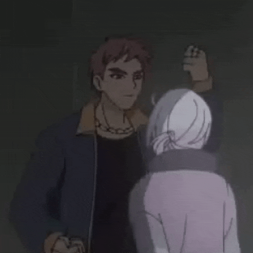 a man and a woman are standing next to each other and talking .