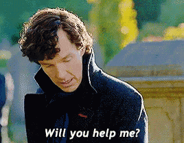 a man in a black coat says will you help me .