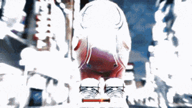 a blurred image of a person 's feet with a red arrow pointing to their feet